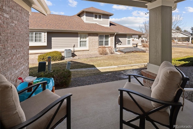 view of patio with central AC unit and outdoor lounge area