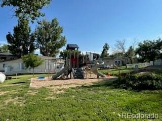 view of play area featuring a lawn