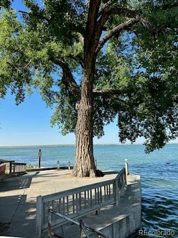 view of property's community featuring a water view