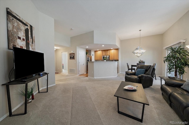 living area with baseboards, visible vents, light colored carpet, an inviting chandelier, and recessed lighting