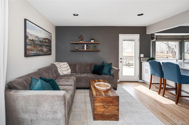 living room featuring light wood-type flooring