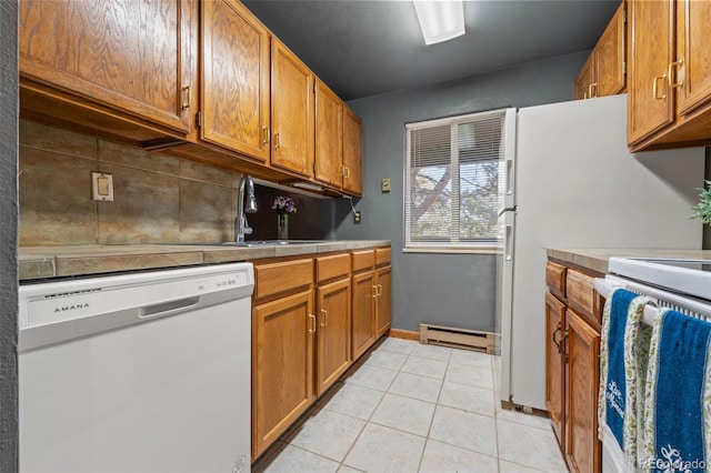 kitchen with dishwasher, sink, a baseboard radiator, decorative backsplash, and light tile patterned flooring