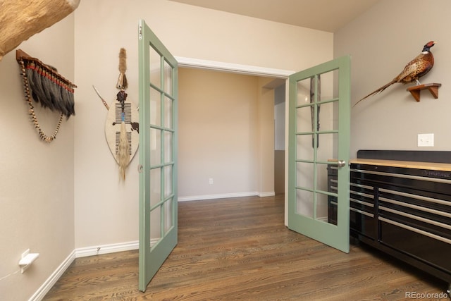 1849 Mud Hen Dr, Colorado Springs, CO 80921 - corridor featuring french doors and wood finished floors