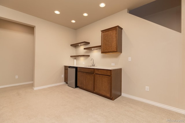 1849 Mud Hen Dr, Colorado Springs, CO 80921 - indoor wet bar featuring dishwashing machine, light colored carpet, and recessed lighting