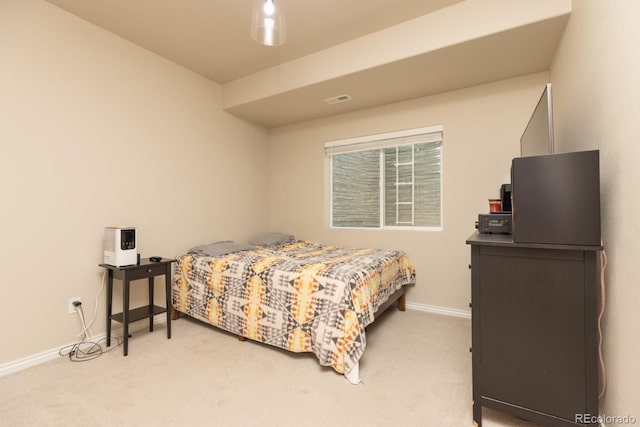 1849 Mud Hen Dr, Colorado Springs, CO 80921 - bedroom featuring light carpet and baseboards