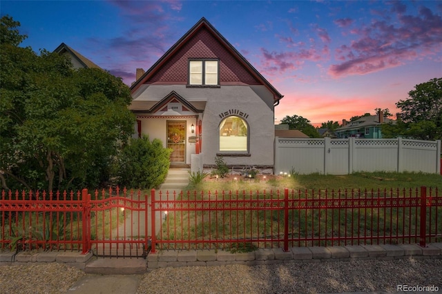3106 N Franklin St, Denver, CO 80205 - victorian house featuring stucco siding and a fenced front yard