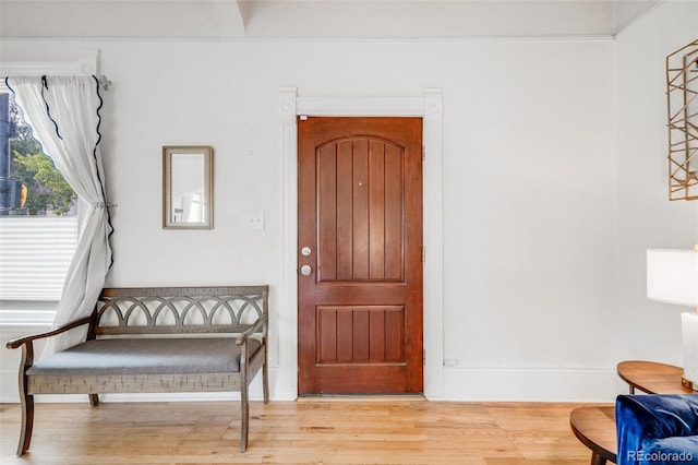 3106 N Franklin St, Denver, CO 80205 - foyer entrance with light wood-style floors and baseboards