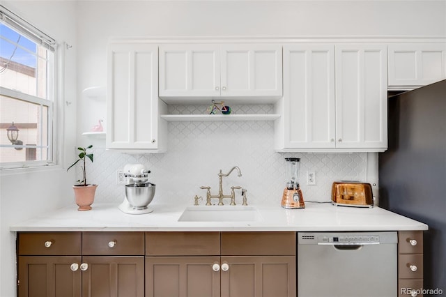 3106 N Franklin St, Denver, CO 80205 - kitchen featuring dishwasher, open shelves, tasteful backsplash, and white cabinets