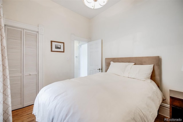 3106 N Franklin St, Denver, CO 80205 - bedroom featuring wood finished floors and a closet