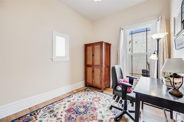 3106 N Franklin St, Denver, CO 80205 - home office featuring baseboards and light wood finished floors