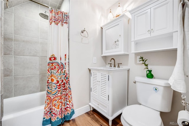 3106 N Franklin St, Denver, CO 80205 - full bathroom featuring wood finished floors, vanity, and shower / tub combo with curtain
