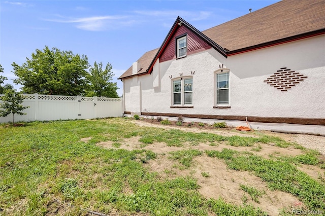 3106 N Franklin St, Denver, CO 80205 - view of side of property with stucco siding