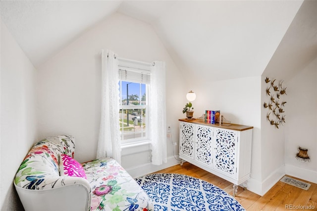 3106 N Franklin St, Denver, CO 80205 - bedroom with vaulted ceiling and light wood-type flooring