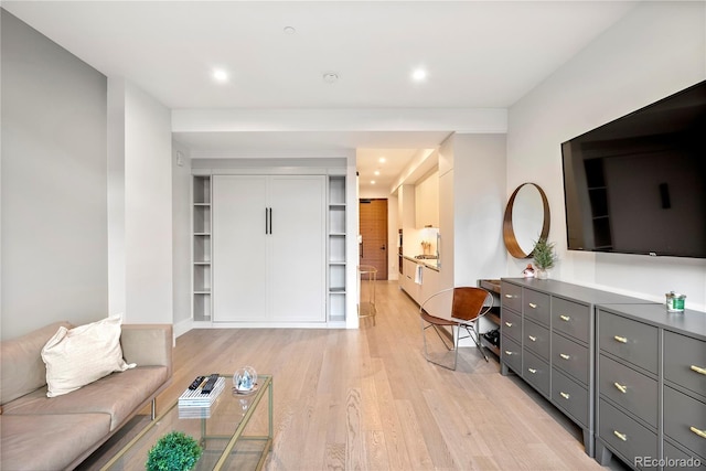 interior space with light wood finished floors and recessed lighting