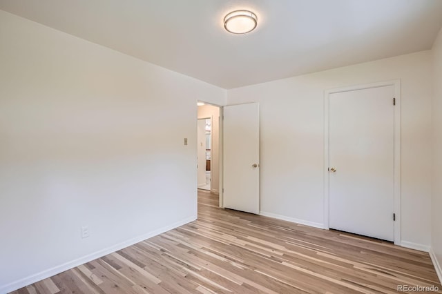 366 Kenton St, Aurora, CO 80010 - unfurnished bedroom with light wood-type flooring