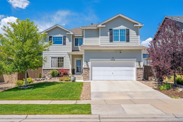 13463 Tamarac Pl, Thornton, CO 80602 - view of front of property with a garage, stone siding, concrete driveway, and a shingled roof
