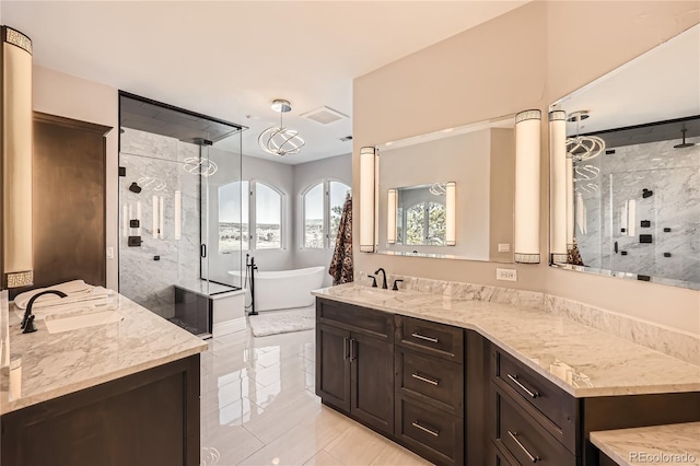 bathroom featuring vanity and plus walk in shower