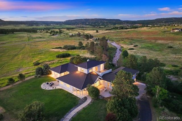 aerial view at dusk with a rural view