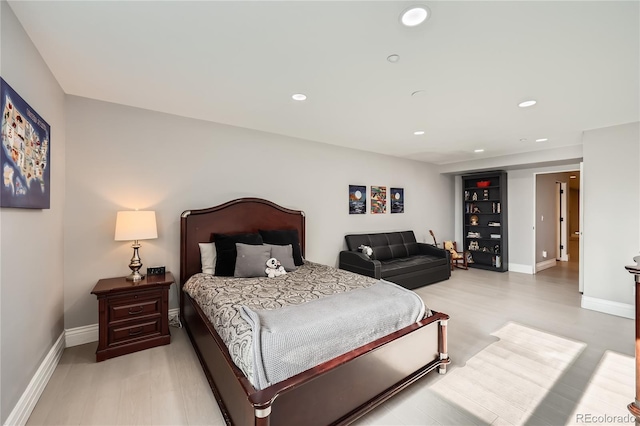 bedroom featuring light wood-type flooring