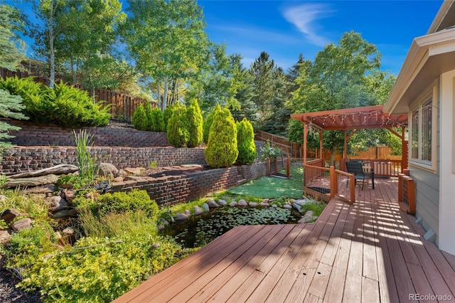 11932 W 56th Cir, Arvada, CO 80002 - deck featuring a pergola and a fenced backyard