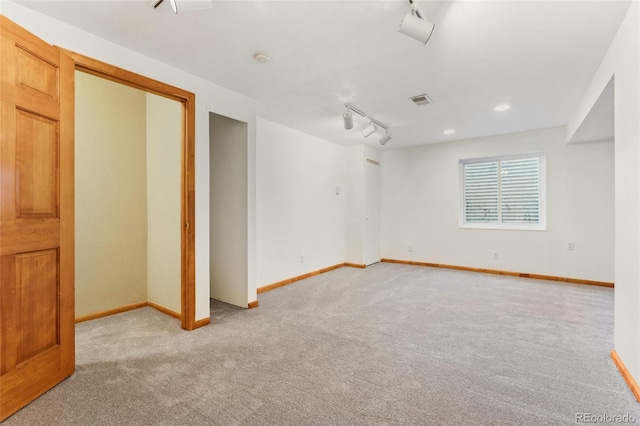 11932 W 56th Cir, Arvada, CO 80002 - unfurnished bedroom with carpet and rail lighting