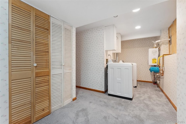 11932 W 56th Cir, Arvada, CO 80002 - laundry area featuring washer / dryer, water heater, wallpapered walls, and carpet floors