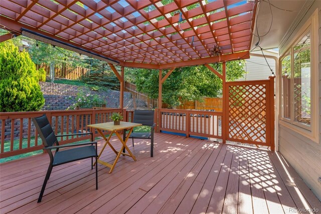 11932 W 56th Cir, Arvada, CO 80002 - wooden terrace featuring a fenced backyard and a pergola