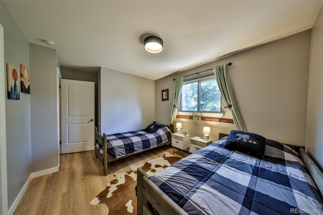 466 Hi Country Dr Unit 109, Winter Park, CO 80482 - bedroom with wood finished floors