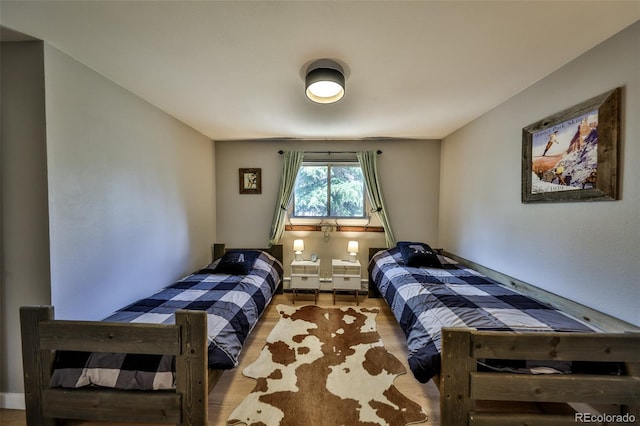 466 Hi Country Dr Unit 109, Winter Park, CO 80482 - bedroom featuring wood finished floors