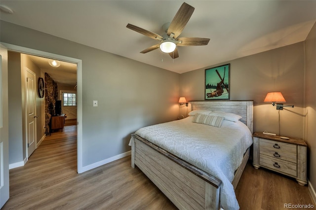 466 Hi Country Dr Unit 109, Winter Park, CO 80482 - bedroom featuring wood finished floors and a ceiling fan