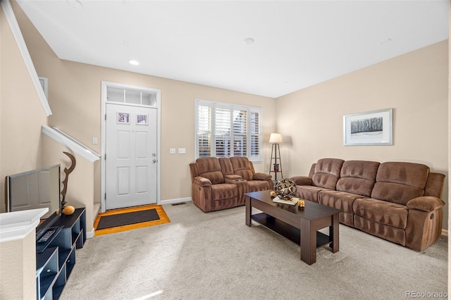 living area featuring carpet, visible vents, baseboards, and recessed lighting