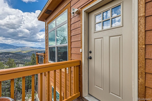 72 Hilltop Dr, Bailey, CO 80421 - view of exterior entry featuring a mountain view