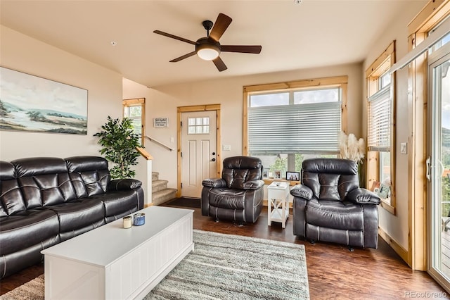 72 Hilltop Dr, Bailey, CO 80421 - living area featuring wood finished floors, ceiling fan, and stairway