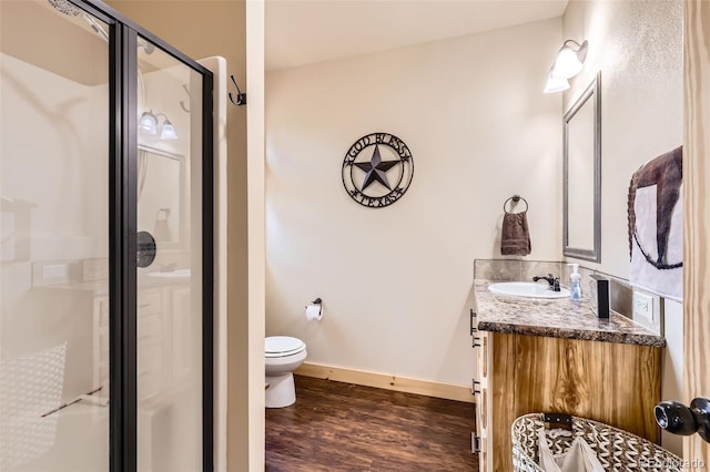 72 Hilltop Dr, Bailey, CO 80421 - full bath with vanity, a stall shower, and wood finished floors