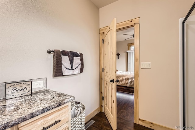 72 Hilltop Dr, Bailey, CO 80421 - hall with dark wood finished floors and baseboards