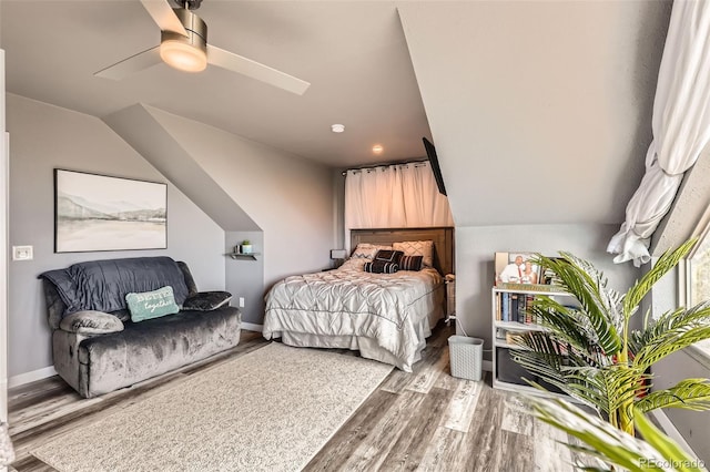 72 Hilltop Dr, Bailey, CO 80421 - bedroom with wood finished floors, a ceiling fan, and vaulted ceiling