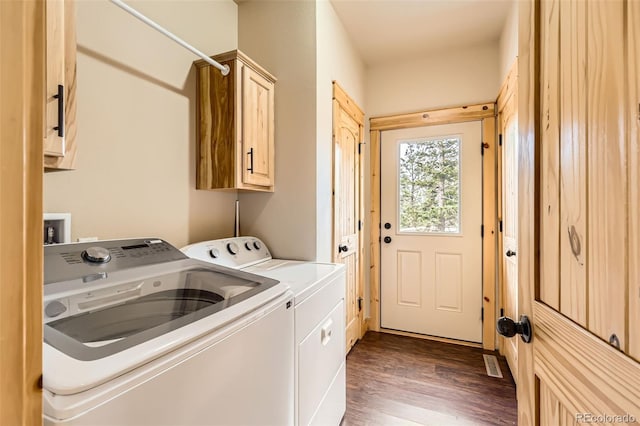 72 Hilltop Dr, Bailey, CO 80421 - washroom featuring washer and clothes dryer, cabinet space, and dark wood finished floors