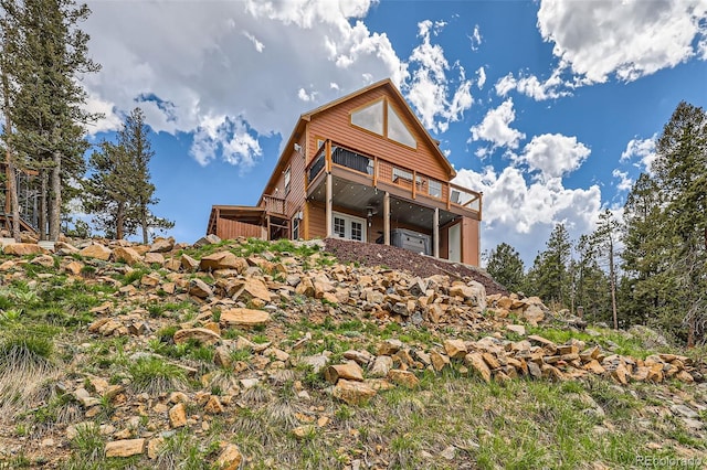 72 Hilltop Dr, Bailey, CO 80421 - rear view of property featuring a deck