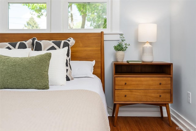 3332 N Vine St, Denver, CO 80205 - bedroom featuring wood finished floors and baseboards