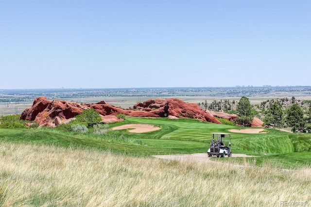 view of home's community with view of golf course