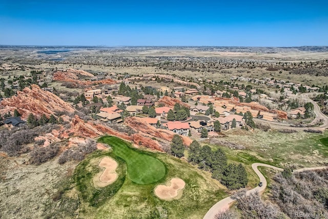 aerial view with view of golf course and a residential view