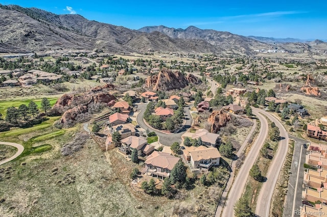 drone / aerial view featuring a mountain view and a residential view