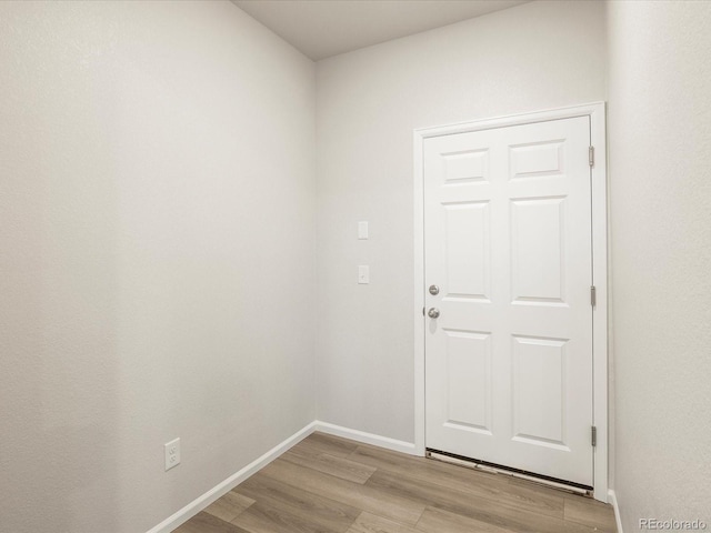 doorway with light hardwood / wood-style floors