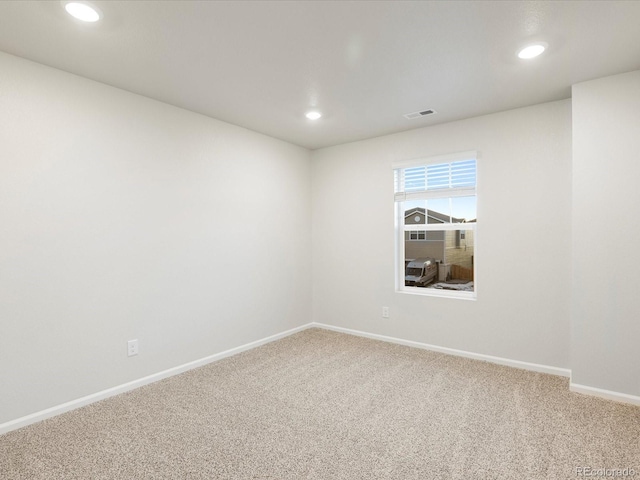 view of carpeted spare room