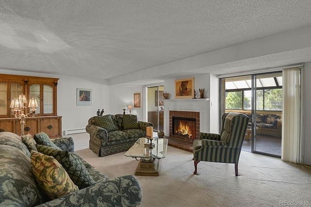 7000 E Quincy Ave Unit 302, Denver, CO 80237 - living area featuring a textured ceiling, carpet flooring, a baseboard radiator, and a fireplace