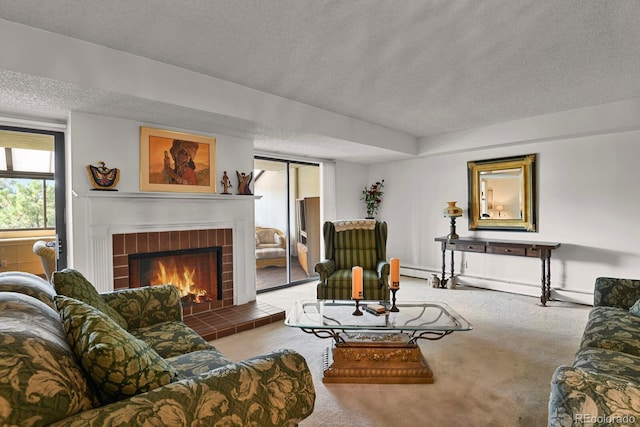 7000 E Quincy Ave Unit 302, Denver, CO 80237 - carpeted living area with a textured ceiling and a fireplace