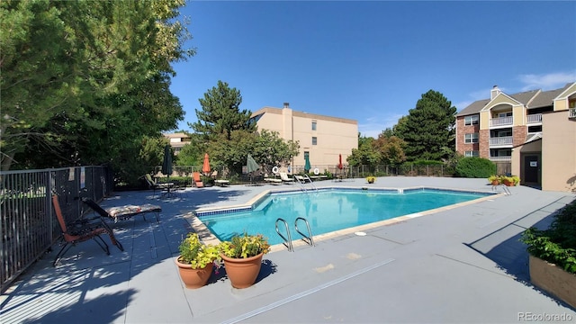 7000 E Quincy Ave Unit 302, Denver, CO 80237 - community pool with a patio area