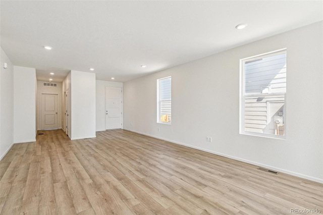 9332 Bahama Ct, Commerce City, CO 80022 - interior space featuring light wood-style flooring, baseboards, visible vents, and recessed lighting