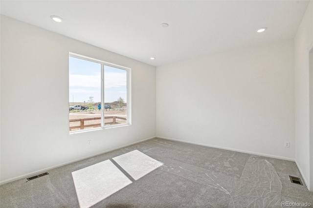 9332 Bahama Ct, Commerce City, CO 80022 - carpeted spare room featuring baseboards, recessed lighting, and visible vents