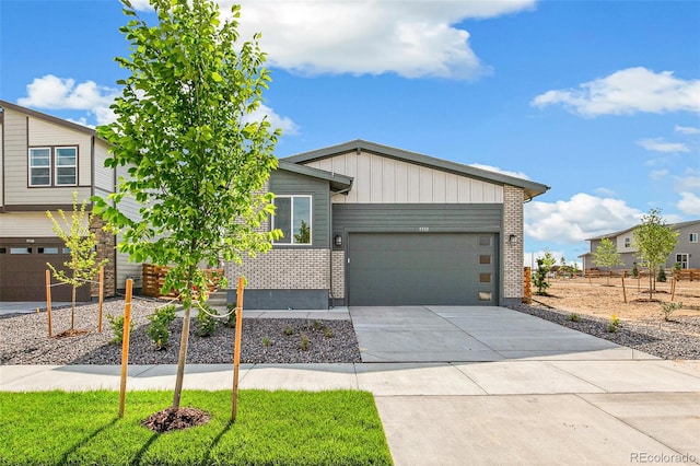 9332 Bahama Ct, Commerce City, CO 80022 - single story home featuring concrete driveway, an attached garage, and brick siding